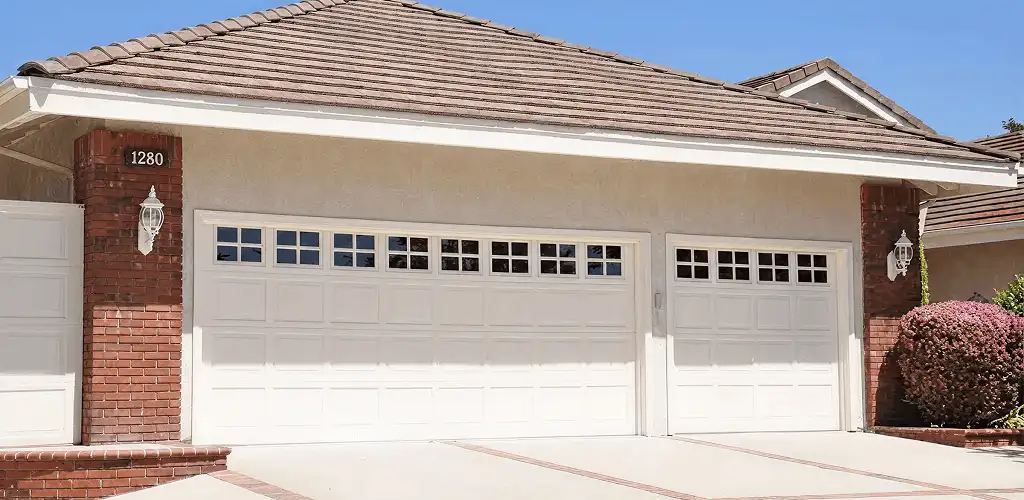 Residential garage door repair service for a double garage door in Clearwater, FL