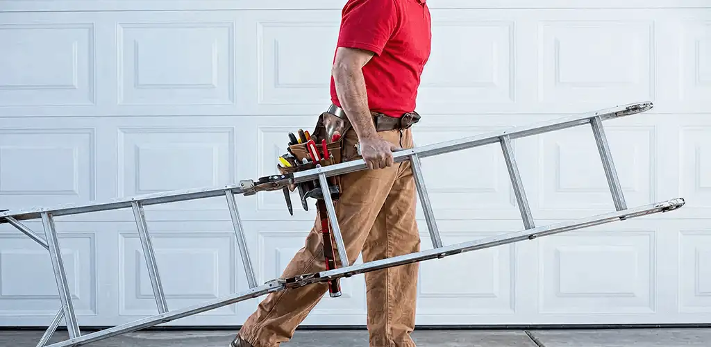Garage door repair technician arriving with tools and ladder in Clearwater, FL