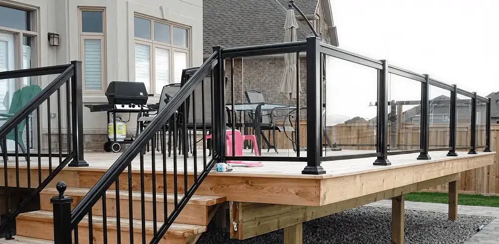 Handrail installation on a deck staircase for safety and code compliance in Clearwater, FL