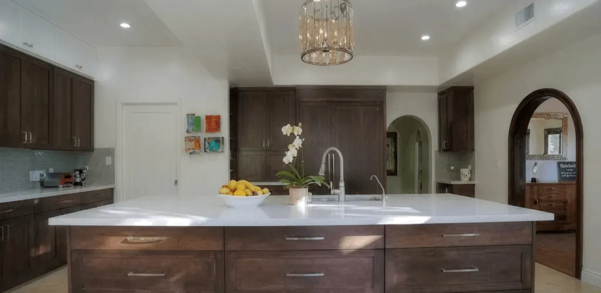 Cabinet refacing project with updated kitchen cabinets and island in Clearwater, FL
